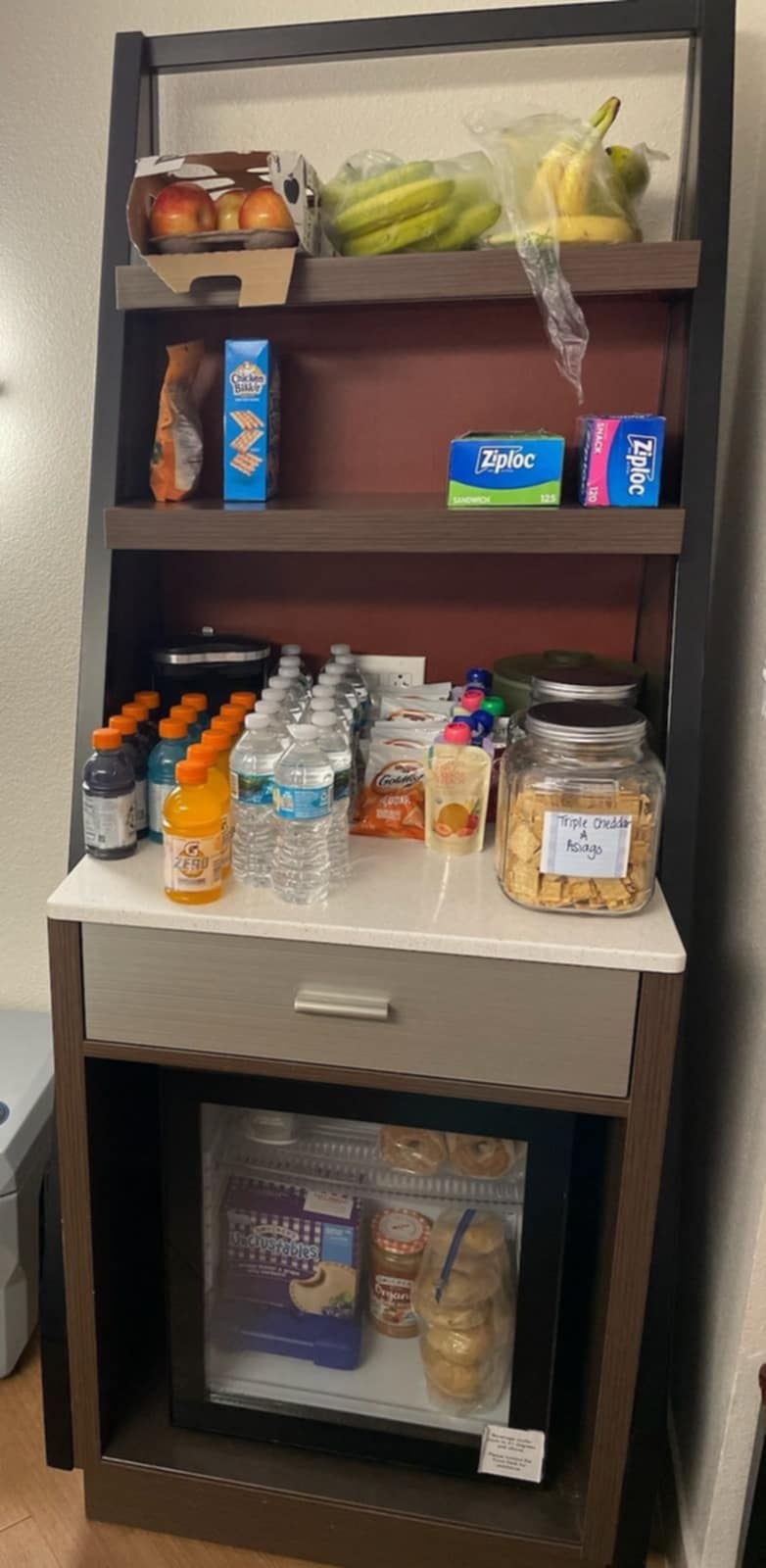 an array of snacks stored in our hotel room