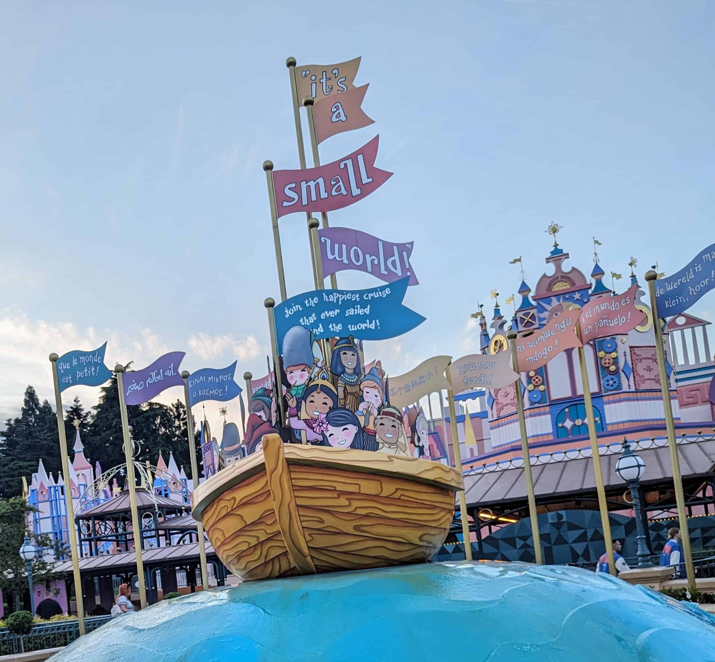 Image of the boat on top of a globe outside the "It's a Small World" ride