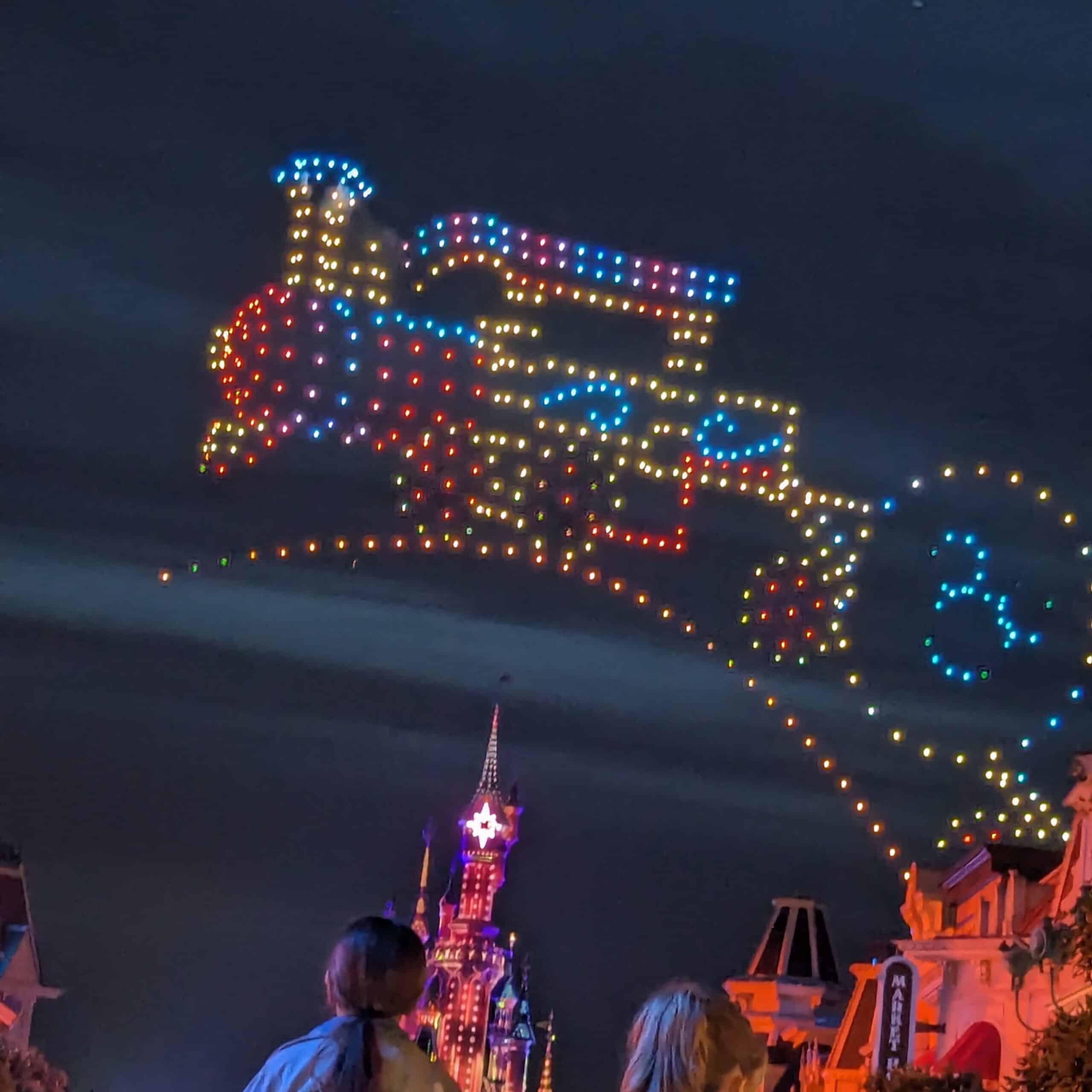 Drones over the Sleeping Beauty Castle for the nighttime sky parade drone show