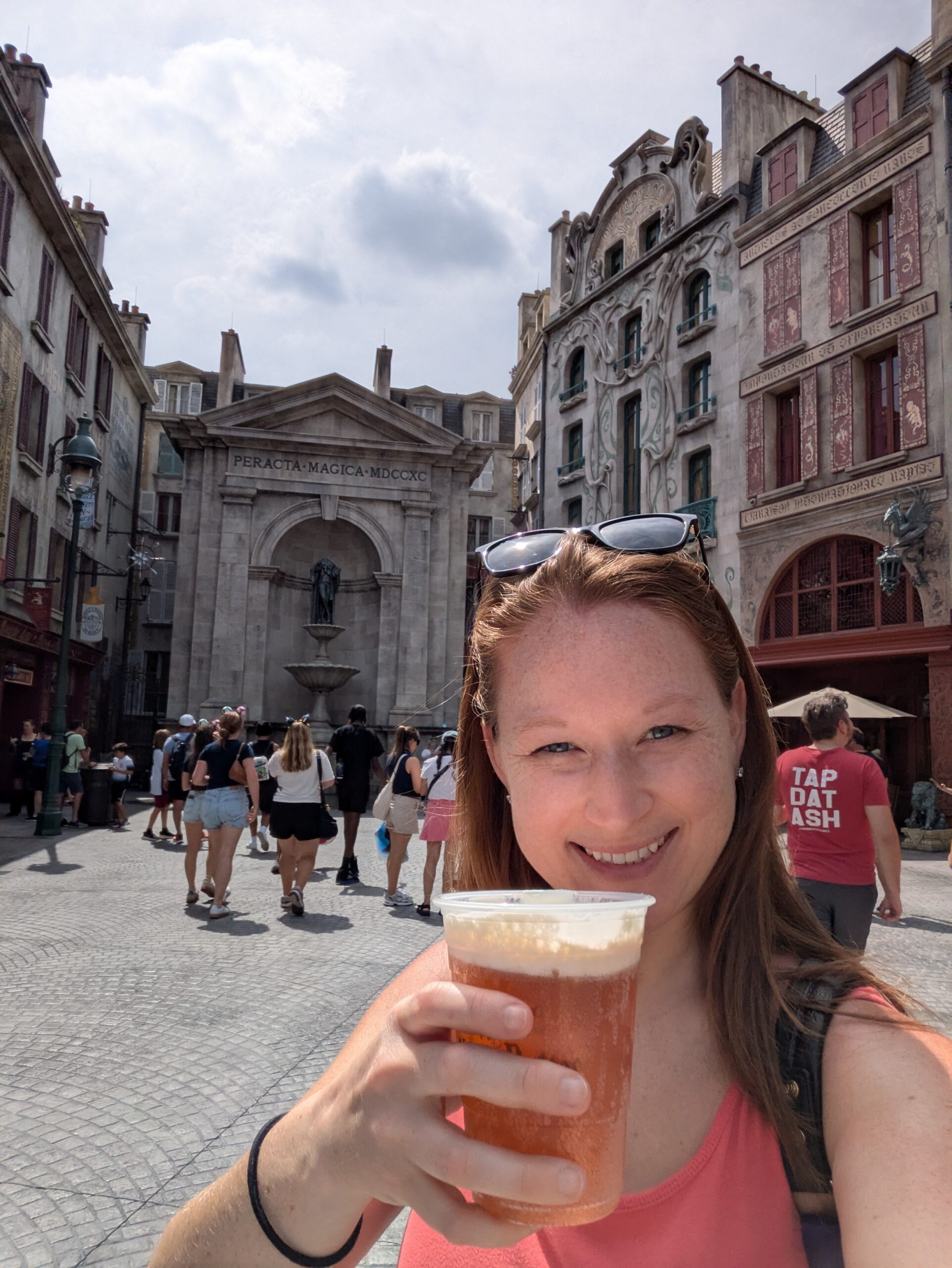 Me drinking butterbeer in the french pavilion of harry potter world