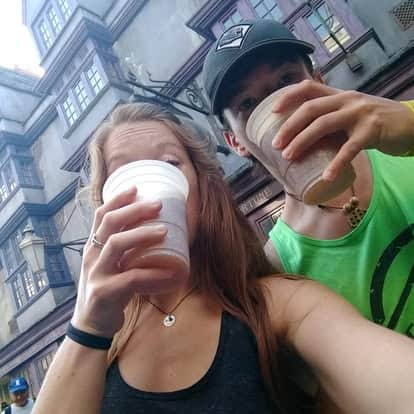 My brother and I drinking Butterbeer in Diagon alley