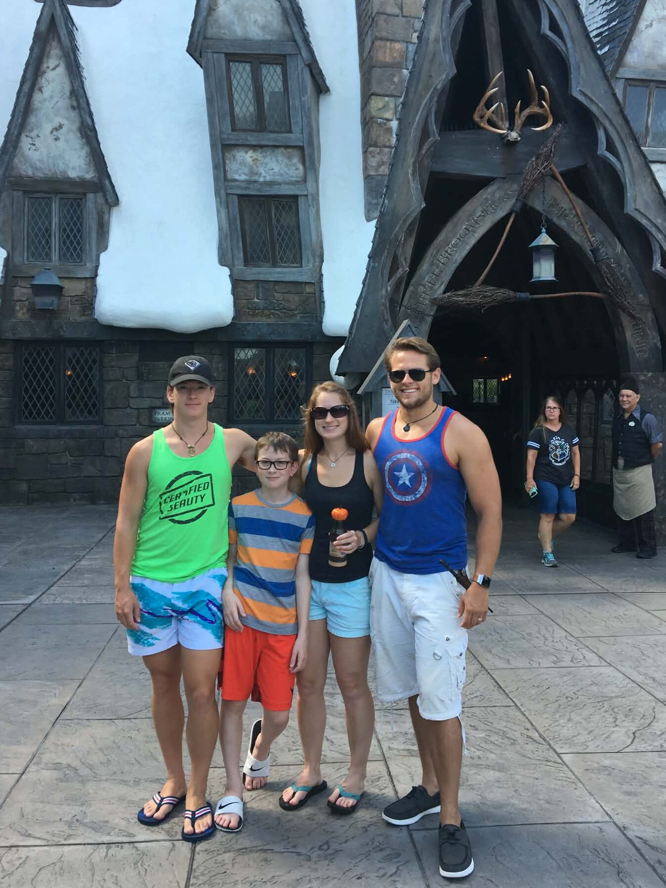 Me and family standing in front of The Three Broomsticks Restaurant